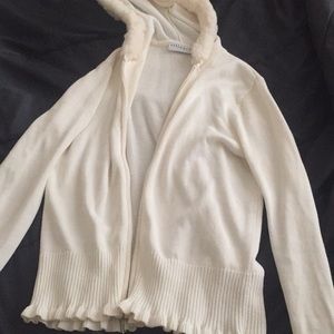 A cute ruffled sweater!